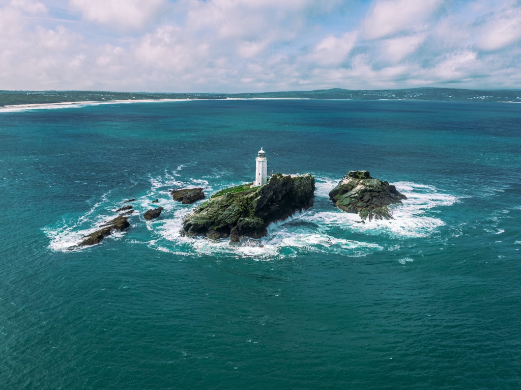 Godrevy beach lighthouse expodes beaches